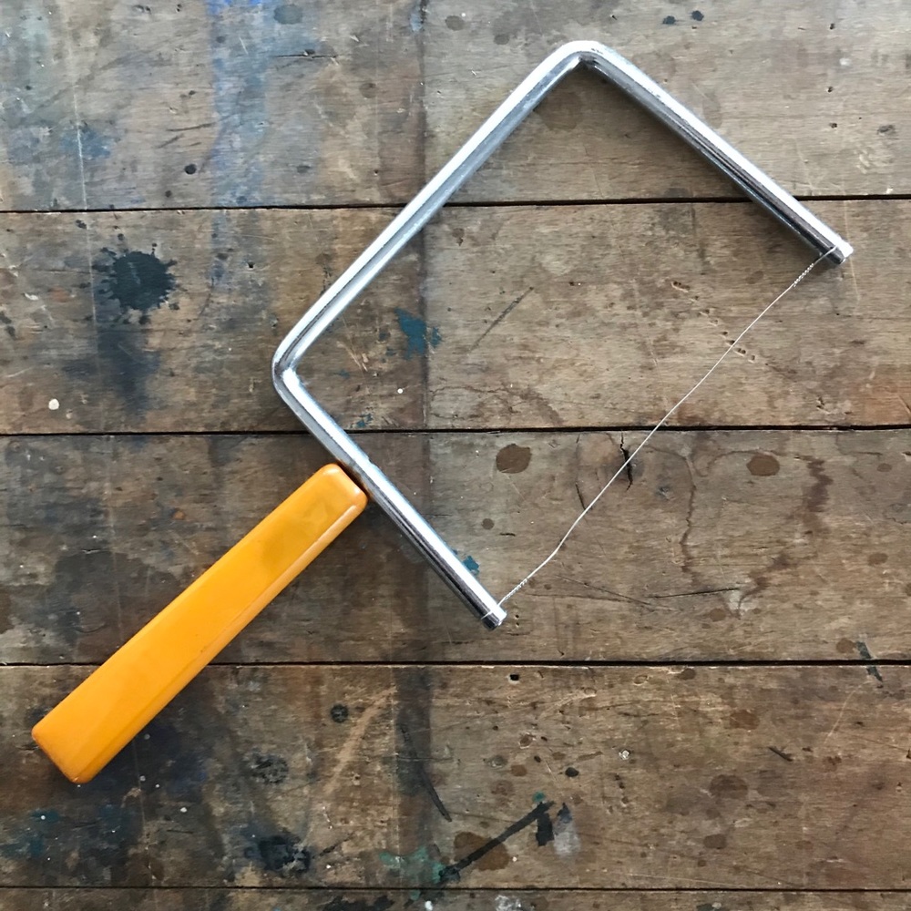 Vintage Bakelite cheese slicer